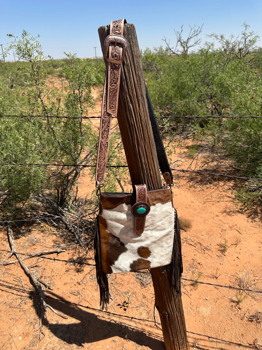 Cowhide Crossbody with Fringe and Emblem